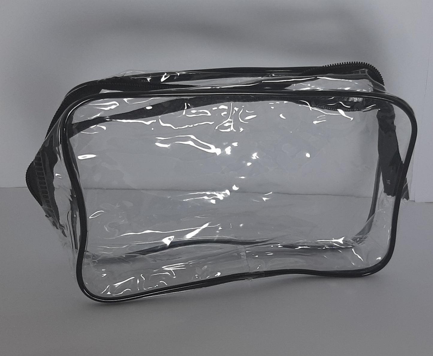 TROUSSE DE VOYAGE TRANSPARENTE